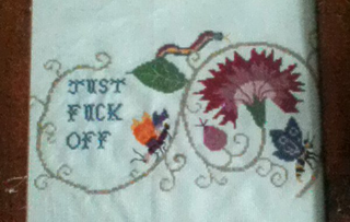 Illustration for article titled Sweary Cross-Stitch